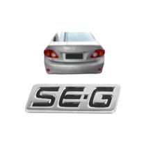 Emblema Letreiro SE-G Cromado com Preto Corolla 2009 a 2014 Emblema Letreiro SE-G Cromado com Preto Corolla 2009 a 2014