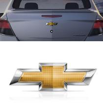 Emblema Porta Mala Gm Gravata Onix E Prisma 2013 Até 2019