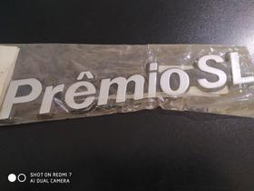 Emblema prêmio sl preto material acrílico com dupla face fácil aplicação