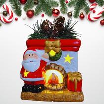 Enfeite Papai Noel Na Lareira em Porcelana com LED 11 cm