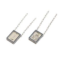 Escapulário caixa zircônia orixá ogum banhado à rhodium