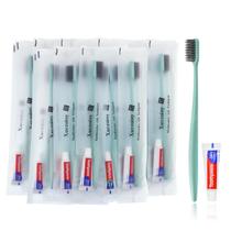 Escovas de dentes descartáveis Xuezoioy com pasta de dente, pacote com 30 unidades verdes