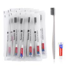 Escovas de dentes descartáveis Xuezoioy com pasta de dente, pacote com 60