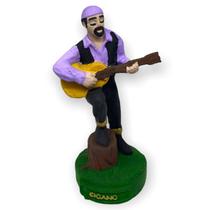 Escultura Cigano Lilas 11 cm em Resina Escultura Cigano Lilas 11 cm em Resina