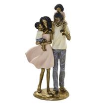 Escultura familia color decorativa negra e casal de filhos - stock