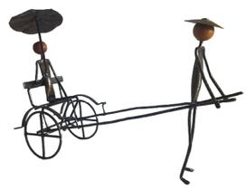 Escultura Homem Levado Em Carroça Ferro Ferrugem Obra De Arte