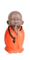 Escultura monge funny laranja 15cm rezando Escultura monge funny laranja 15cm rezando