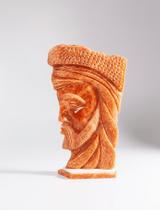 Escultura rosto de homem lapidado em calcita laranja