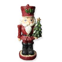 Escultura soldado quebra nozes com arvore de natal