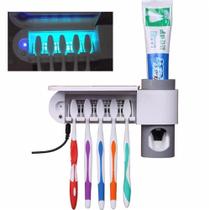 Esterelizador de escova de dentes e dispenser de pasta de dente ultra violeta 5 em 1 com suporte Esterelizador de escova de dentes e dispenser de pasta de dente ultra violeta 5 em 1 com suporte