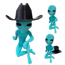 Et Alien Sentado Cowboy