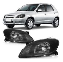 Farol celta 2006 mascara negra lado esquerdo