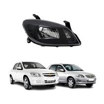 Farol Celta 2007 a 2015 Prisma 2006 a 2012 Mascara Negra Direito (Passageiro) Farol Celta 2007 a 2015 Prisma 2006 a 2012 Mascara Negra Direito (Passageiro)