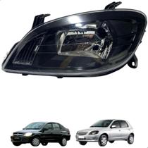 Farol celta prisma 2007 2008 a 2015 mascara negra esquerdo Farol celta prisma 2007 2008 a 2015 mascara negra esquerdo