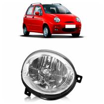 Farol Dianteiro Qq 2010 A 2015 Máscara Cromada