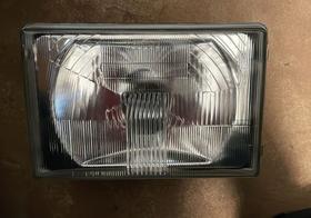 Farol esquerdo gm