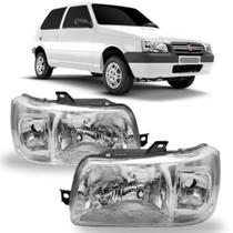 Farol fiat uno 2004 ate 2013 mascara cromada (par) s/cupula