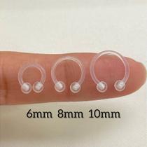 FERRADURA BIOFLEX TRANSPARENTE COM BOLINHAS - 1,2mm FERRADURA BIOFLEX TRANSPARENTE COM BOLINHAS - 1,2mm