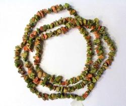 Fio Unakita Cascalho Extra Furado a Laser Pedra Rolada 90cm