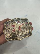 Fivela alto relevo Bull Rider ouro velho Daysa