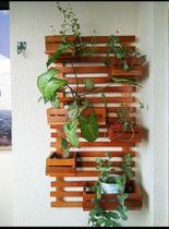 Floreira,jardim vertical, painel madeira, treliça sacadas.