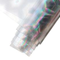 Folha de material sintético PVC holográfico transparente 30 cm x 135 cm Folha de material sintético PVC holográfico transparente 30 cm x 135 cm