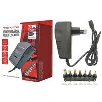 Fonte Universal 30W 3V 4.5V 6V 7.5V 9V 12V 3A 7 Plugues Bivolt Tomate - TOMATE Fonte Universal 30W 3V 4.5V 6V 7.5V 9V 12V 3A 7 Plugues Bivolt Tomate - TOMATE
