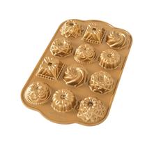 Forma de Bundt Nordic Ware Bundt Charms 280ml - Alumínio Dourado Forma de Bundt Nordic Ware Bundt Charms 280ml - Alumínio Dourado