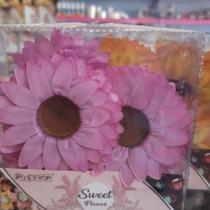 Forma docinho/bomom formato flor. Cor rosa . Quantidade de 24 und por embalagem.