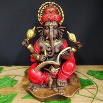 Ganesha com livro envelhecida com vermelho 25cm Ganesha com livro envelhecida com vermelho 25cm