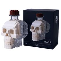 Garrafa de uísque Building Toy Skull com 100 peças de design asteca