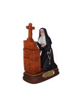 Imagem de Santa Rita de Cássia de joelhos no oratório 12cm em Resina Imagem de Santa Rita de Cássia de joelhos no oratório 12cm em Resina