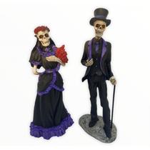 Imagem Exu e Pomba Gira Caveira Casal Roxo Resina
