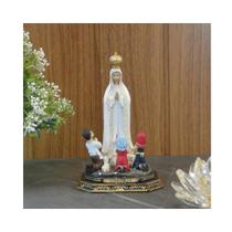 Imagem Nossa Senhora de Fatima com pastores resina importada 17cm