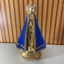 Imagem religiosa nossa senhora aparecida dourada com pérola azul de gesso santa católica Imagem religiosa nossa senhora aparecida dourada com pérola azul de gesso santa católica