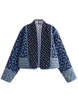 Jaqueta feminina OPCAKM recortada com estampa floral azul reversível XS