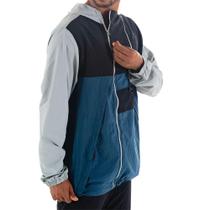 Jaqueta Oakley Travel Nomad Windbreaker Masculina Azul/Preto