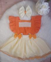Jardineira Moana com tule brilhante e detalhe na barra laço de cabelo para aniversario e mesversario Jardineira Moana com tule brilhante e detalhe na barra laço de cabelo para aniversario e mesversario