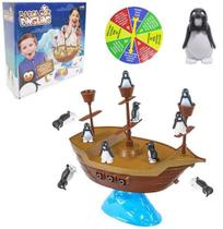 Jogo barca dos pinguins com roleta de micos 59 pecas colors na caixa - UNIK