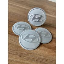 Jogo com 4 emblemas logo adesivo roda 51mm prata resinado ( 851076)