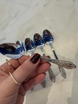 Jogo de 6 colheres para sobremesa em aço inox com detalhes dourados Jogo de 6 colheres para sobremesa em aço inox com detalhes dourados