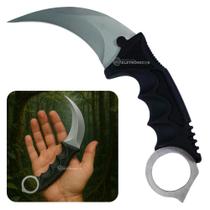 Karambit com Lâmina Afiada Inox, Empunhadura com Furo e Capinha Protetora SLKD86 - PDE Karambit com Lâmina Afiada Inox, Empunhadura com Furo e Capinha Protetora SLKD86 - PDE
