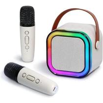 Karaoke Infantil Portátil Bluetooth Efeitos de Voz Divertidos LED Multicolor com 2 Microfones Karaoke Infantil Portátil Bluetooth Efeitos de Voz Divertidos LED Multicolor com 2 Microfones