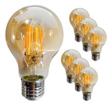Kit 03 Lâmpadas Filamento Led Retrô A60 4w Âmbar Bivolt E27 Kit 03 Lâmpadas Filamento Led Retrô A60 4w Âmbar Bivolt E27