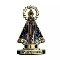 Kit 10 Enfeite de Nossa Sra Aparecida Dourado, Com Resplendor Cravejado, 8cm e Auto Colante Kit 10 Enfeite de Nossa Sra Aparecida Dourado, Com Resplendor Cravejado, 8cm e Auto Colante