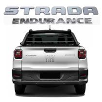 Kit 2 Emblema Cromado Tampa Traseira Strada Endurence Modelo Original Kit 2 Emblema Cromado Tampa Traseira Strada Endurence Modelo Original