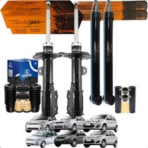 Kit 4 Amortecedor Completo Coifa Batente Coxim Dianteiro Traseiro Ford Fiesta Hatch Sedan