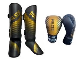 Kit Caneleiras 20 MM e Luvas de Boxe Muay Thai Preto Dourado Pulser Kit Caneleiras 20 MM e Luvas de Boxe Muay Thai Preto Dourado Pulser
