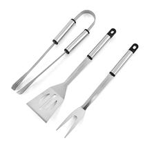 Kit Churrasco Inox 3 Peças com Cabos de Madeira Espátula, Pegador e Garfo Kit Churrasco Inox 3 Peças com Cabos de Madeira Espátula, Pegador e Garfo