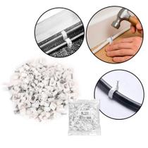 Kit com 100 Fixadores de Fios e Cabos 10mm com Prego Plástico Resistente para Parede - Genérica Kit com 100 Fixadores de Fios e Cabos 10mm com Prego Plástico Resistente para Parede - Genérica